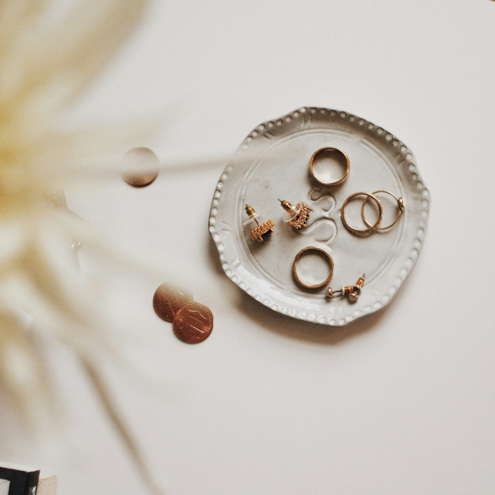 Gold jewelry flat lay used within an independent retail website direction